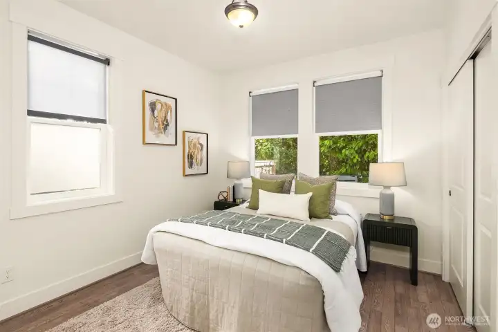 Here is the second primary bedroom that is located on the main level. This is great for aging in place or a terrific guest suite.