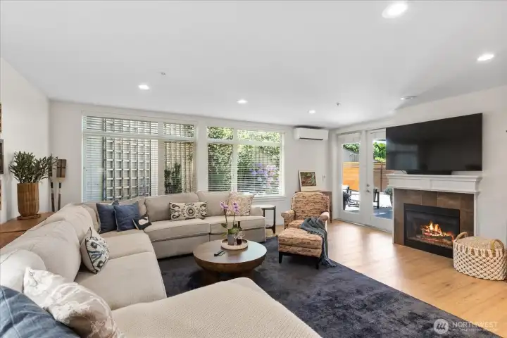 with windowed walls of south light . . gas fireplace. . . with windowed walls of south light . . gas fireplace. . .