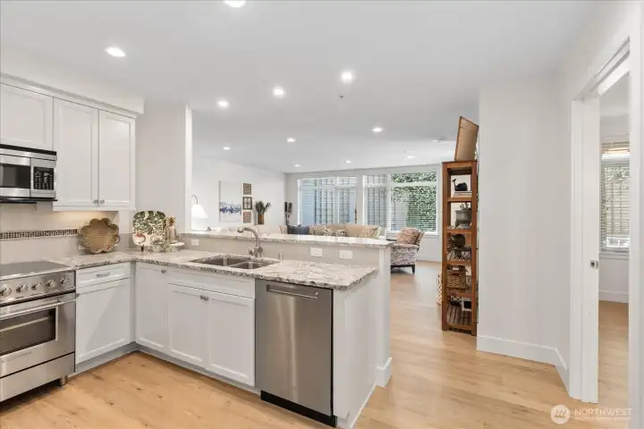Refreshed kitchen with upscale newer appliances, granite counters . . .is open to great room. Refreshed kitchen with upscale newer appliances, granite counters . . .is open to great room.