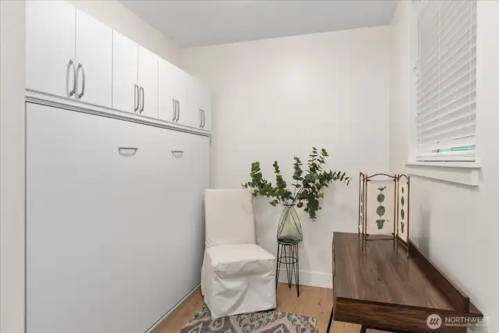 Efficient den has a built in Murphy bed for a convenience. Efficient den has a built in Murphy bed for a convenience.