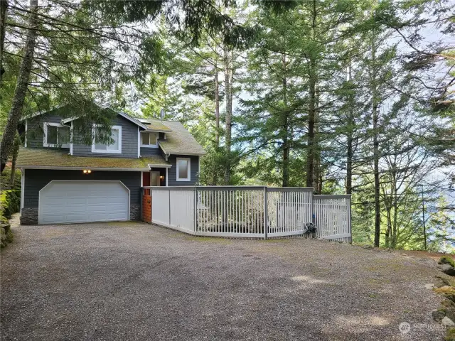 Ample parking with 2 car attached garage and driveway