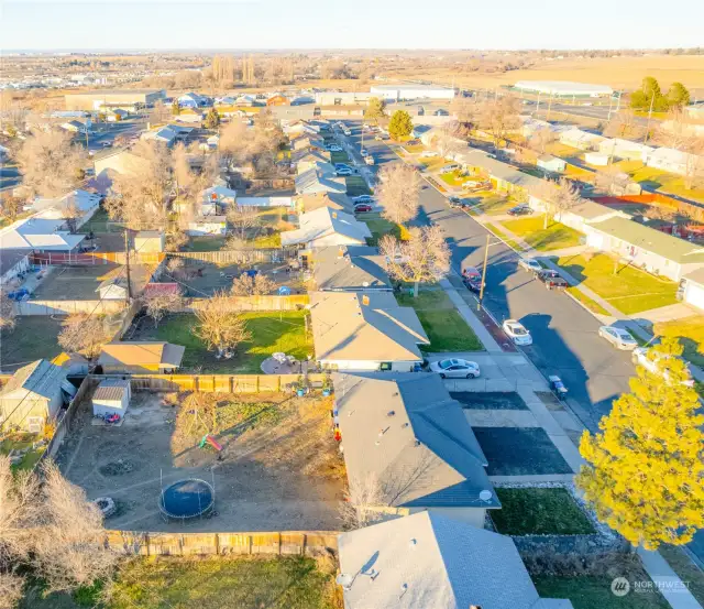 Large, Flat, Fully Fenced Back-Yard.