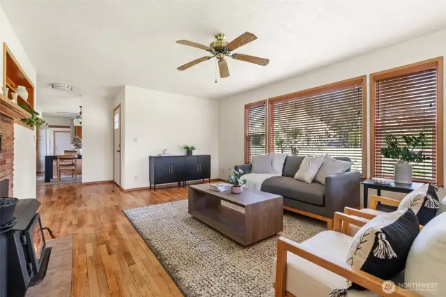 Living Room, front entry back into dining and kitchen