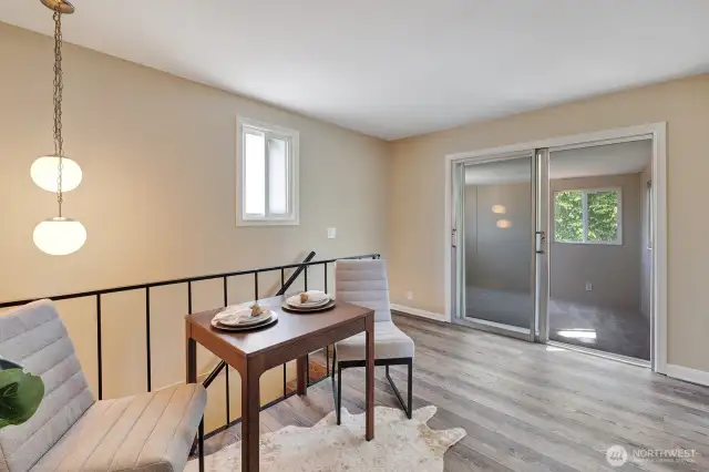 Lounge area upstairs with access to bonus area