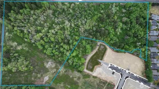 Tumwater Development Opportunity – Prime 18.89-Acre Parcel.  An exceptional opportunity awaits with this expansive parcel featuring nearly a 1/4 mile of frontage on Trosper Road.  Access and utilities are available in the street. - Boundary lines are approximated -