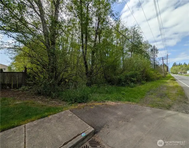 View of the Northeast corner on Trosper Road at the adjacent Lakeside neighborhood boundary