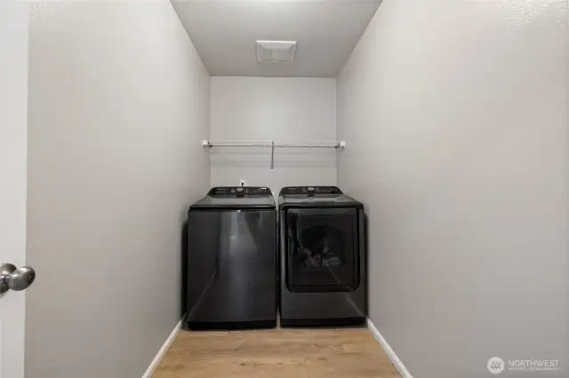 The laundry room is conveniently located near all bedrooms.