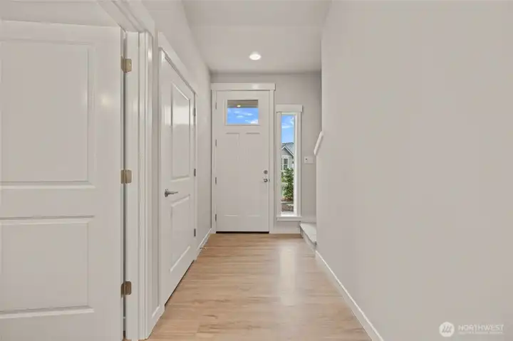 LVP flooring is throughout the entry, great room, dining room and kitchen.