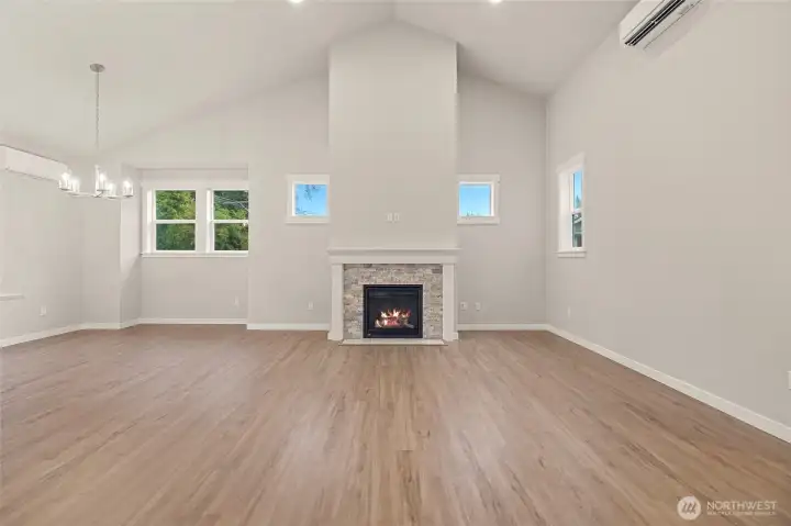 There is a gas fireplace with mantle in the great room.