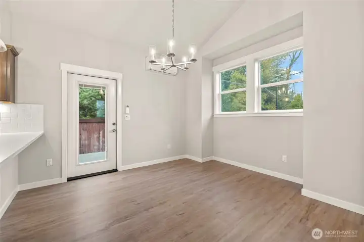The dining room opens out onto a patio.