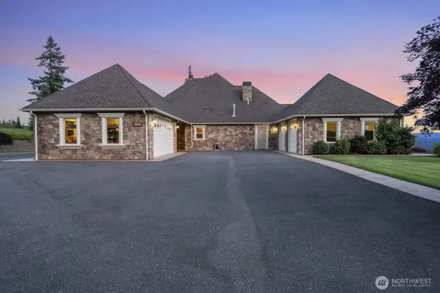Garage parking for 4. There is an attached 2 door, 2-car garage and a detached garage/shop, and carport. Total covered parking for 6 cars
