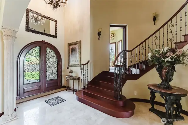 Beautiful 2" Teakwood French entry doors were imported from Indonesia. When you step inside you will notice the beautiful polished travertine tile floors.
