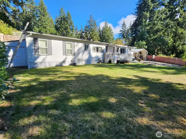 This beautiful MFH is located in Beards Cove Belfair WA Situated on a 100x100 lot