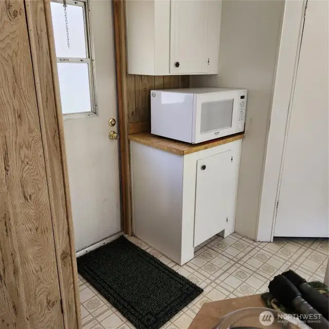 1 Back door exit near the pantry