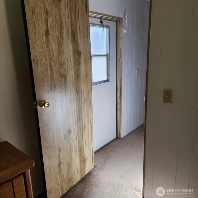 Exit from bedroom end of hallway to outside
