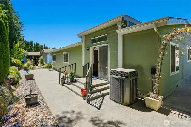 Back patio with access to the community greenbelt and trail.