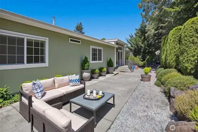Back patio with access to the community greenbelt and trail.  Virtually staged photo.
