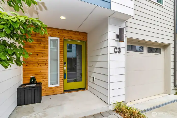 Modern Townhome Entry in Lynnwood, WA – Westbrook I Community  Step into contemporary style with this beautifully designed townhome in Lynnwood’s Westbrook I community. Featuring a bold front door, wood-accented siding, and a private attached garage, this entryway highlights the perfect balance of modern architecture and Northwest charm. The covered entry offers convenience and curb appeal, welcoming you home to a low-maintenance lifestyle just minutes from Lake Stickney, Mill Creek Town Center, Alderwood Mall, I-5, Hwy 99, and the upcoming light rail. Whether you’re commuting to Seattle or Bellevue, this Lynnwood townhome provides both comfort and location.