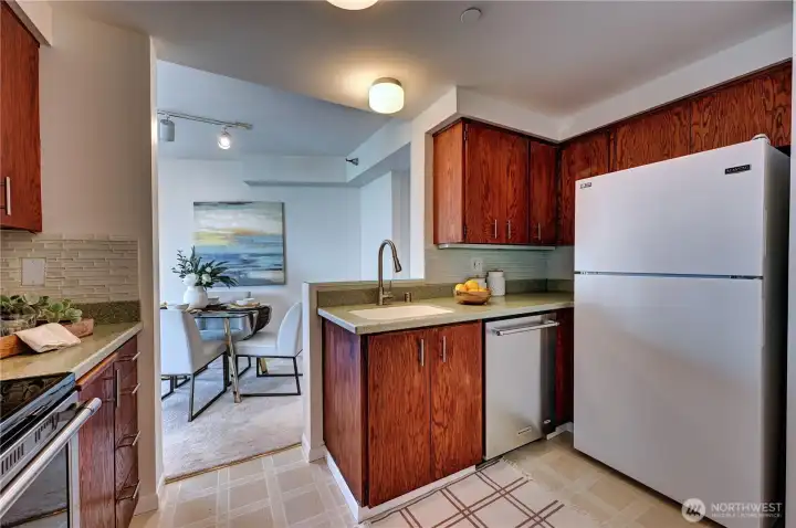Another view of the kitchen located in the center of the home.