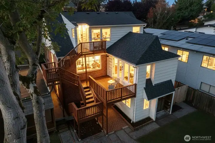 Primary suite has its own outside entrance- can be used as rental.
