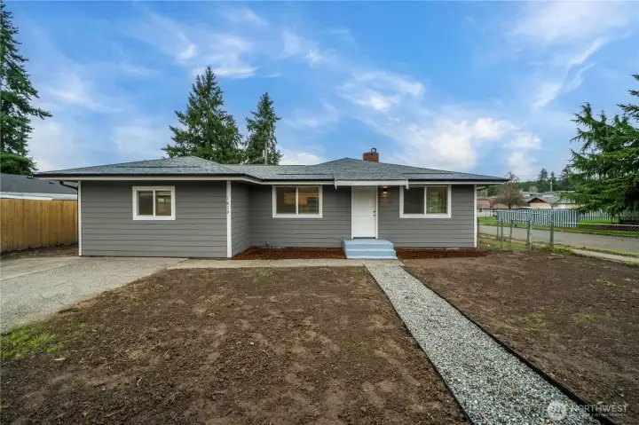 Re-vamped landscaping with new walkway and yard. Grass to sprout soon!