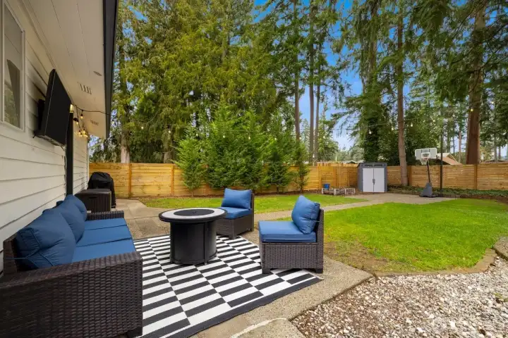 Huge backyard offers a peaceful, park-like setting—perfect for entertaining, gardening, or simply relaxing.