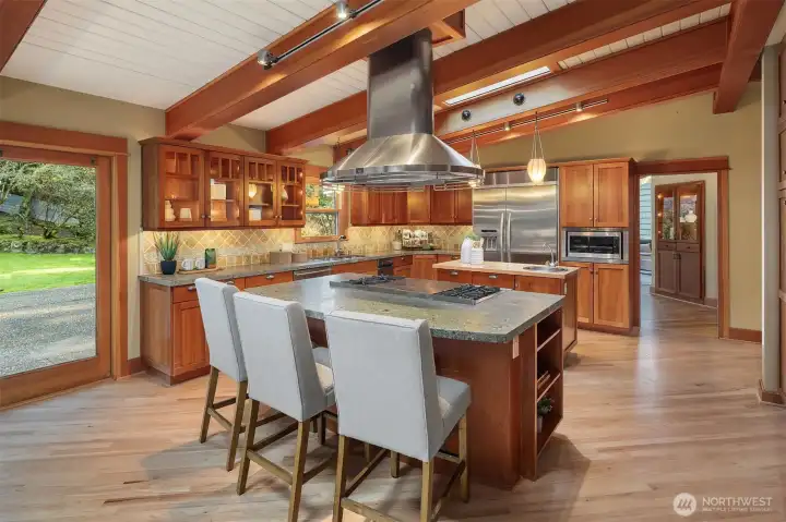 Kitchen flows to great room and outdoor patio for seamless entertaining