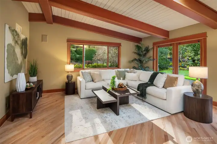 Cozy great room is extended beyond the kitchen