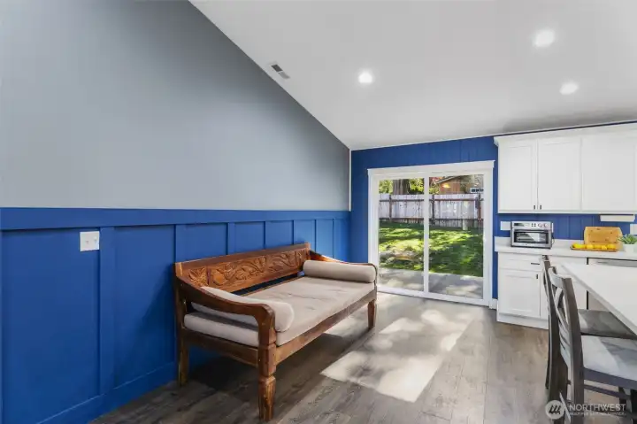 Slider to fully fenced backyard.