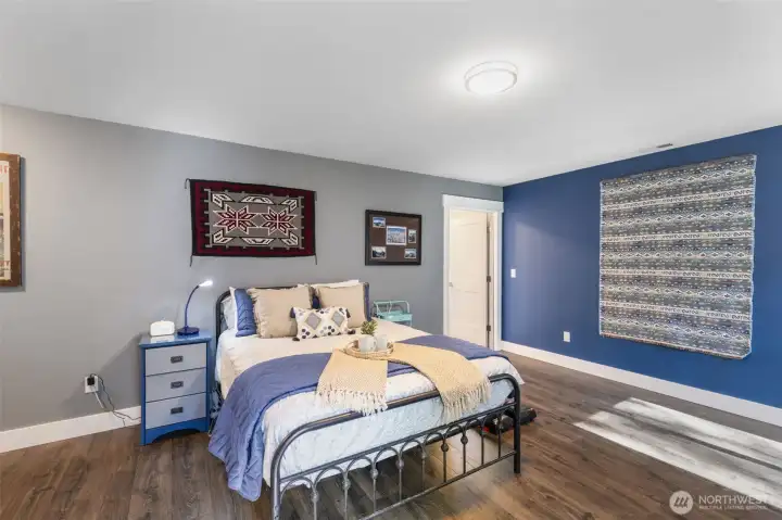 Another view of primary bedrdoom looking onto en suite.