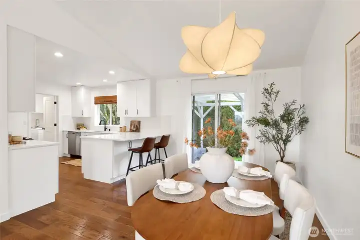 Wow—total showstopper! From the dining area, the kitchen steals the spotlight with a warm, Pottery Barn–inspired feel that’s both timeless and on-trend.