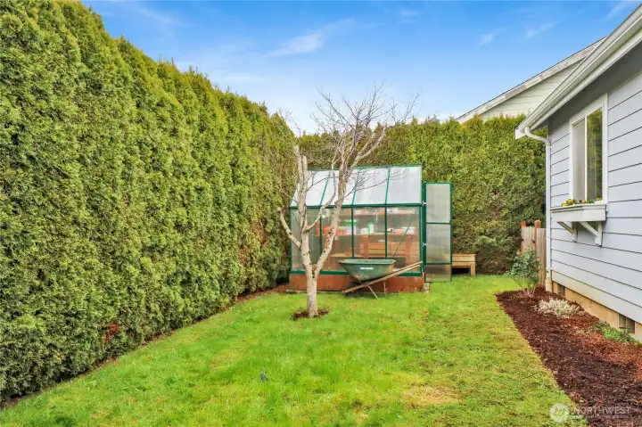 The backyard is perfectly sized for entertaining, grilling, or enjoying a touch of gardening—low-maintenance and ready for your personal touch!