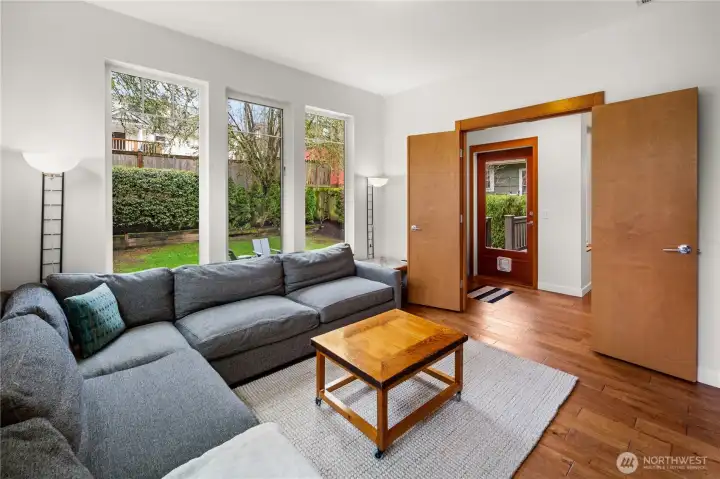 A flex space off the main living floor offers a quiet retreat with backyard views, and room to adapt as a den, family room, or home office.