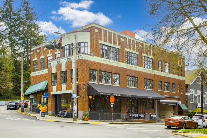 McClellan Street The historic 1925 brick building just steps away is home to Mioposto, the beloved neighborhood wood-fired pizza and Italian kitchen that's been a Mt. Baker fixture since 2006, as well as Vitality Pilates Studio — one of Seattle's most established reformer Pilates studios.
