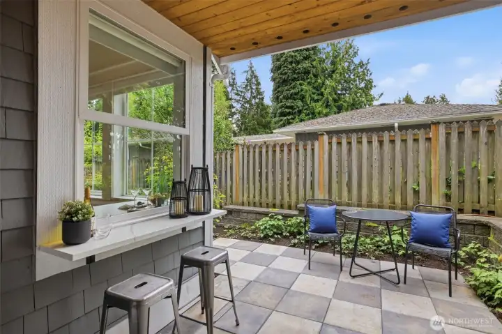 South side patio for BBQ and covered casual dinners.
