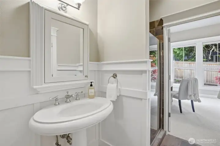 Main floor bathroom with shower.