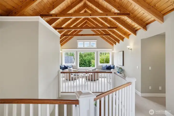 Upper floor facing south flex space separating bedrooms.