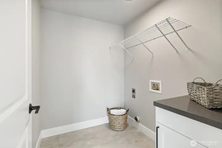Photos are of another home in the community and are for illustration purposes only to reflect typical finishes.  May depict seller enhancements.  Colors and options may vary.