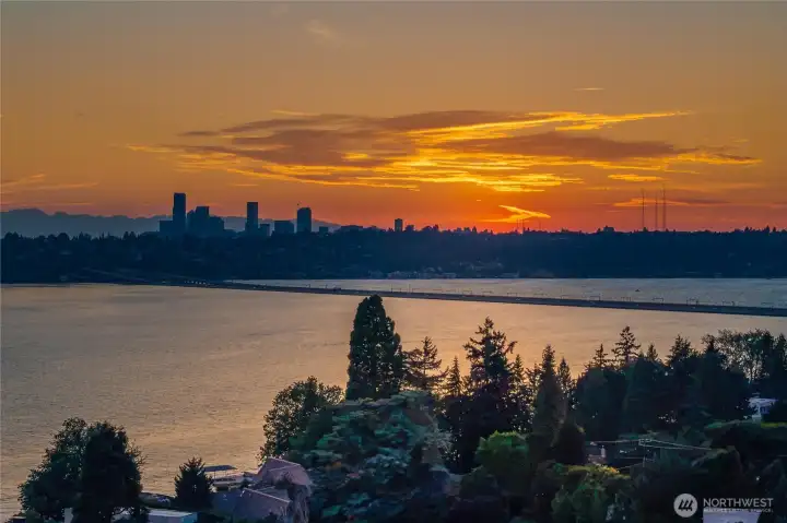 Custom luxury in the prestigious West Mercer location with front-row views of the Blue Angels and Seafair festivities