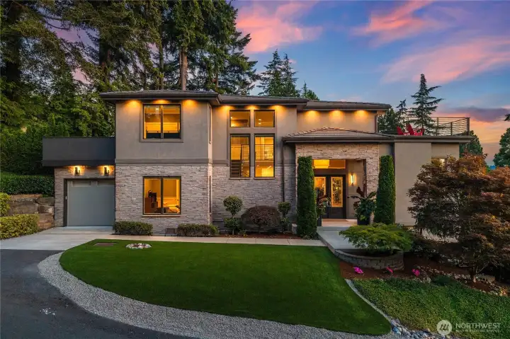 Gated estate offering exceptional privacy and sweeping views of the lake, mountain and city skyline.