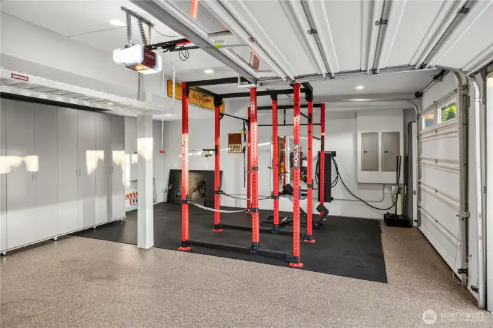 One garage bay is used as gym