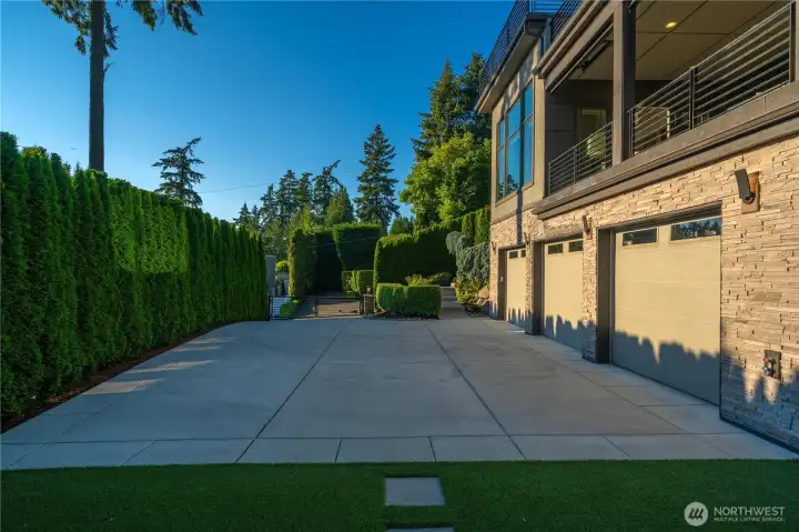 The gated motor court still accommodates six or more additional vehicles, providing exceptional parking for guests and entertaining.