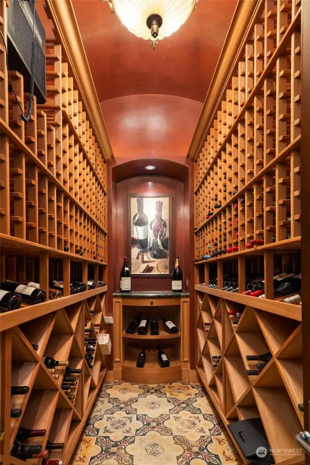 950 Bottle Capacity Wine Cellar with Venetian Plaster finish, Custom Italian Tile, Cedar Racking and Glass Door.