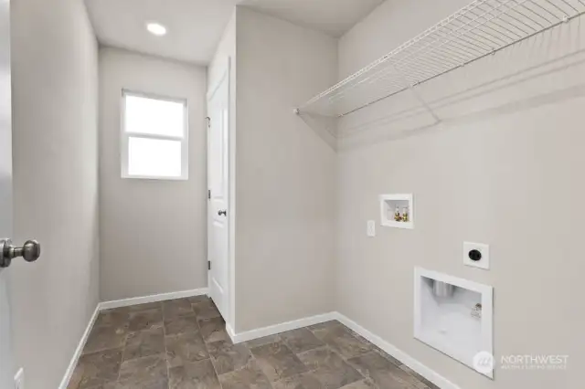 Upstairs Laundry Room. Photos are for representational purposes only, colors, elevation and features may vary.