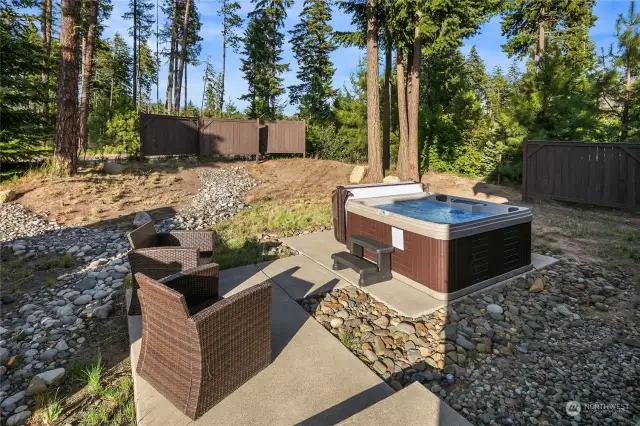 Backyard with hot tub and sitting area!  Great space to relax and enjoy the mountain air!