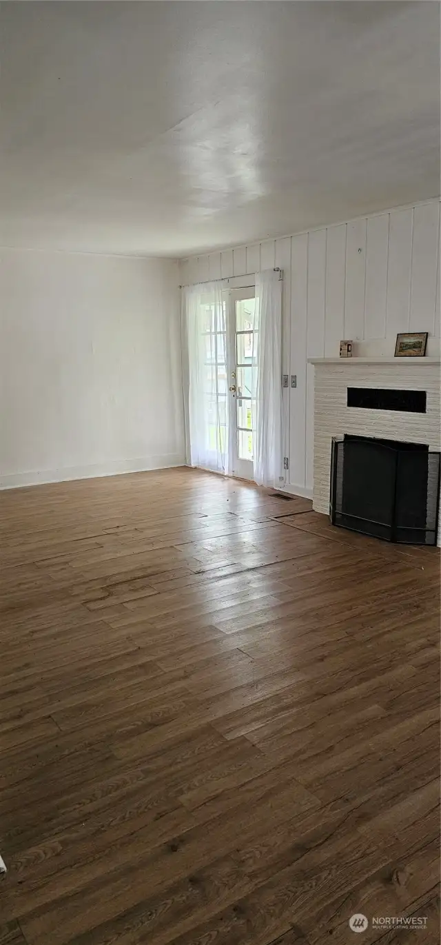 Living room with wood fireplace