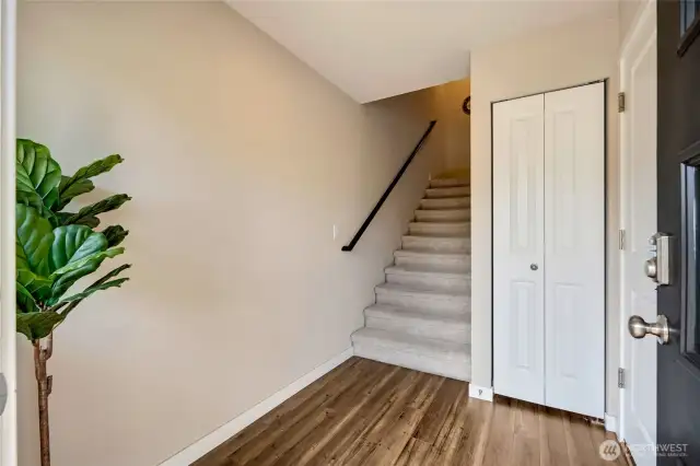 Entrance: Access to garage and coat closet