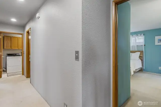 Hallway leading to the large laundry room