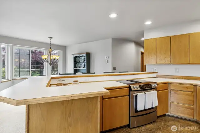 Another angle of the open kitchen flowing seamlessly into the dining room.