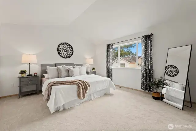 Master bedroom with vaulted ceiling